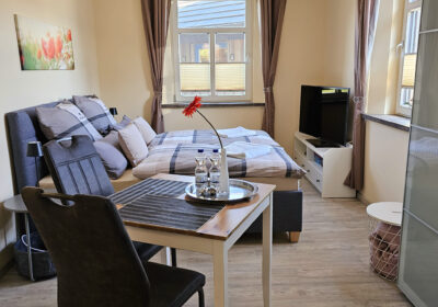 Foto des Wohn- und Schlafbereiches einer Ferienwohnung